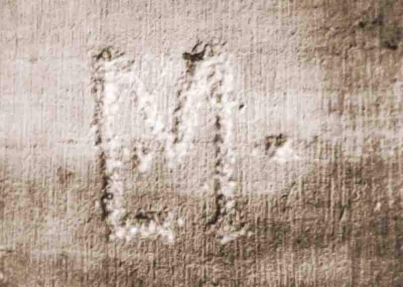 iscrizione presso l'entrata della torre 7