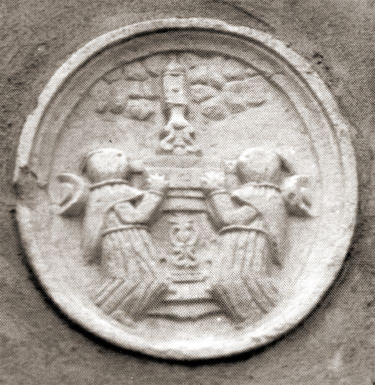 Bassorilievo in pietra raffigurante portatori del SS. Sacramento, nel 3° Vicolo Casalino, 19
