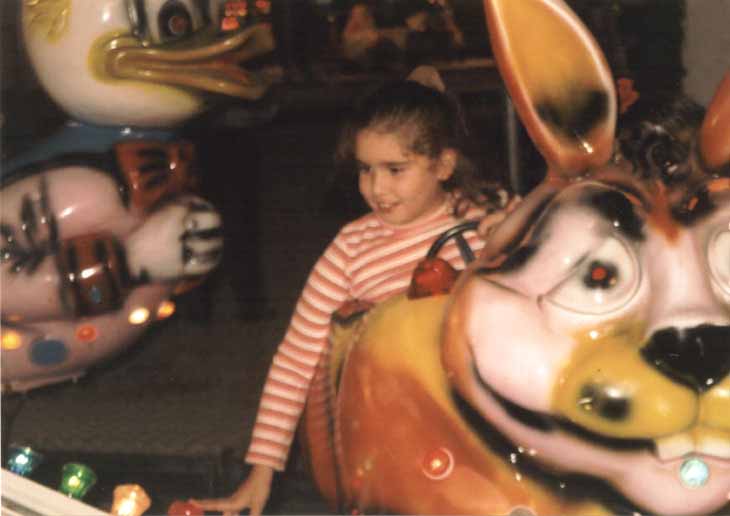 bimbi in giostra